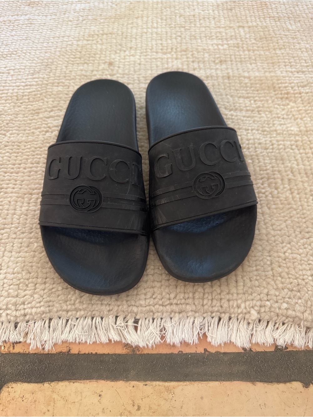 Gucci Black Embossed Logo Rubber Slide Sandals